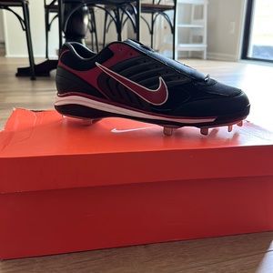 Black and red baseball cleats